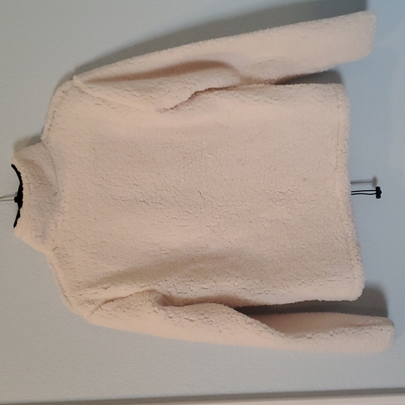 Junior's fleece sweatshirt. Cream with black trim and zippers. Size 1. - Picture 3 of 3